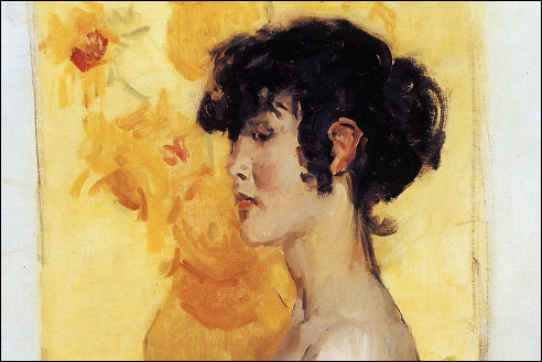 Vrouw voor zonnebloemen